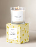 Candle on top of gift box. - Image 