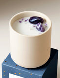 Candle on top of gift box. - Image 