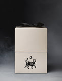 Beige gift box with imprint and black bow. - Image 