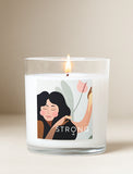 Candle with illustration of woman on the label. - Image 