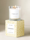 Candle on top of gift box. - Image 
