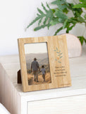 Natural bamboo sympathy picture frame featuring a memorial quote and botanical leaf illustration on a white surface. - Image 