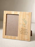 Natural bamboo condolence picture frame featuring a botanical illustration and the quote, Those we love are never gone. - Image 