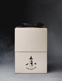 Beige gift box with imprint and black bow. - Image 