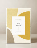 Gift bow in a yellow and brown gift wrap. - Image 