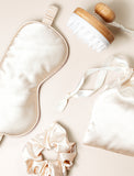 Sleep mask set on beige background. - Image 