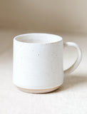 Light beige mug with handle. - Image 