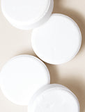 4 shower steamers on a beige background. - Image 