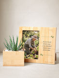 Bamboo succulent planter and matching keepsake photo frame with a sympathy quote on a light background. - Image 