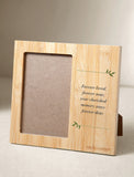Natural bamboo picture frame with a sympathy quote and green leaf accents for memorial keepsakes. - Image 