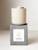Candle on top of gift box. - Image 